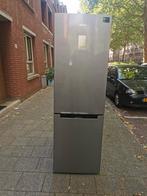 Samsung koelkast met ideale No Frost technologie.
Geen opbou, 200 liter of meer, Met aparte vriezer, Zo goed als nieuw, 45 tot 60 cm