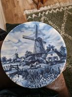 Delfs blauw bord, Ophalen