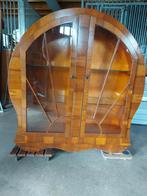 Art deco vitrinekast, Ophalen