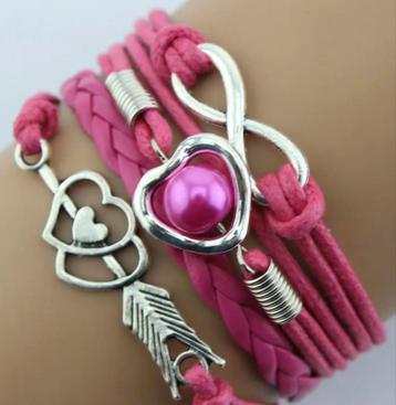 Armbanden pink roze nieuw! Gevlochten. beschikbaar voor biedingen