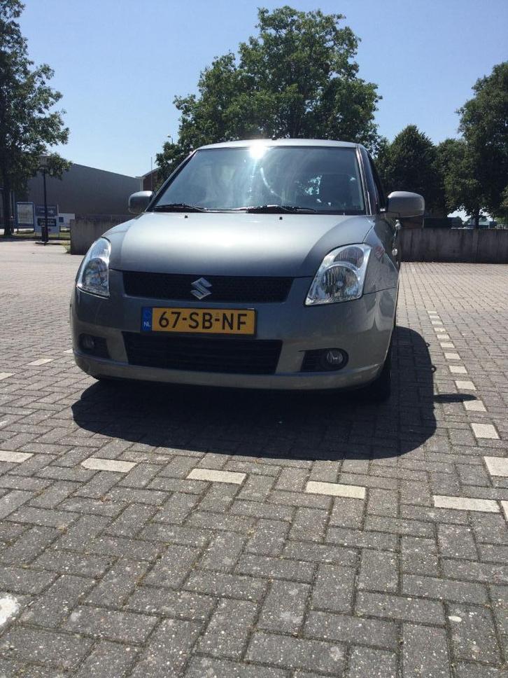 Suzuki Swift Exclusive 1.5 5D 2005 Grijs, Auto's, Suzuki, Particulier, Swift, ABS, Airbags, Boordcomputer, Centrale vergrendeling