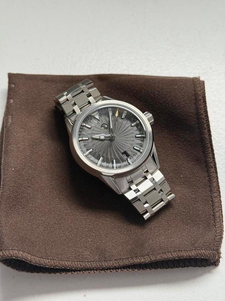 Zelos Helica Slate Grey, Sieraden, Tassen en Uiterlijk, Horloges | Heren, Zo goed als nieuw, Polshorloge, Overige merken, Staal