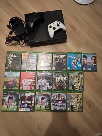 Xbox one met 16 games en 2 controllers beschikbaar voor biedingen