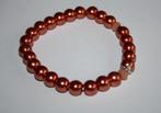 Elastische oranje parelarmband, Sieraden, Tassen en Uiterlijk, Armbanden, Ophalen of Verzenden, Nieuw, Oranje, Elastiek