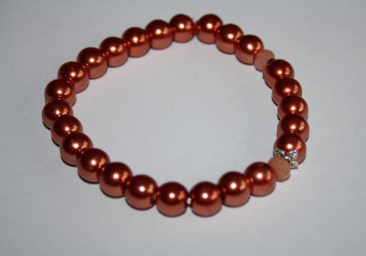 Elastische oranje parelarmband, Sieraden, Tassen en Uiterlijk, Armbanden, Nieuw, Elastiek, Oranje, Ophalen of Verzenden