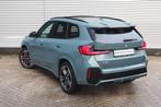 BMW iX1 eDrive20 High Executive M Sport / Panoramadak / Trek, Auto's, BMW, Met garantie (alle), 204 pk, Stoelverwarming, SUV of Terreinwagen