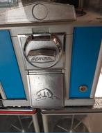 Beaver capsule automaten, Ophalen