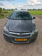 Opel Astra 1.6 16V 85KW St.wgn. 2010 Grijs, Auto's, Opel, Voorwielaandrijving, Metallic lak, Origineel Nederlands, Stationwagon