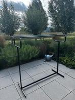 Kledingrek met dubbele hangbuizen, Ophalen