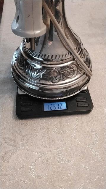 Zilveren staande lamp.  beschikbaar voor biedingen