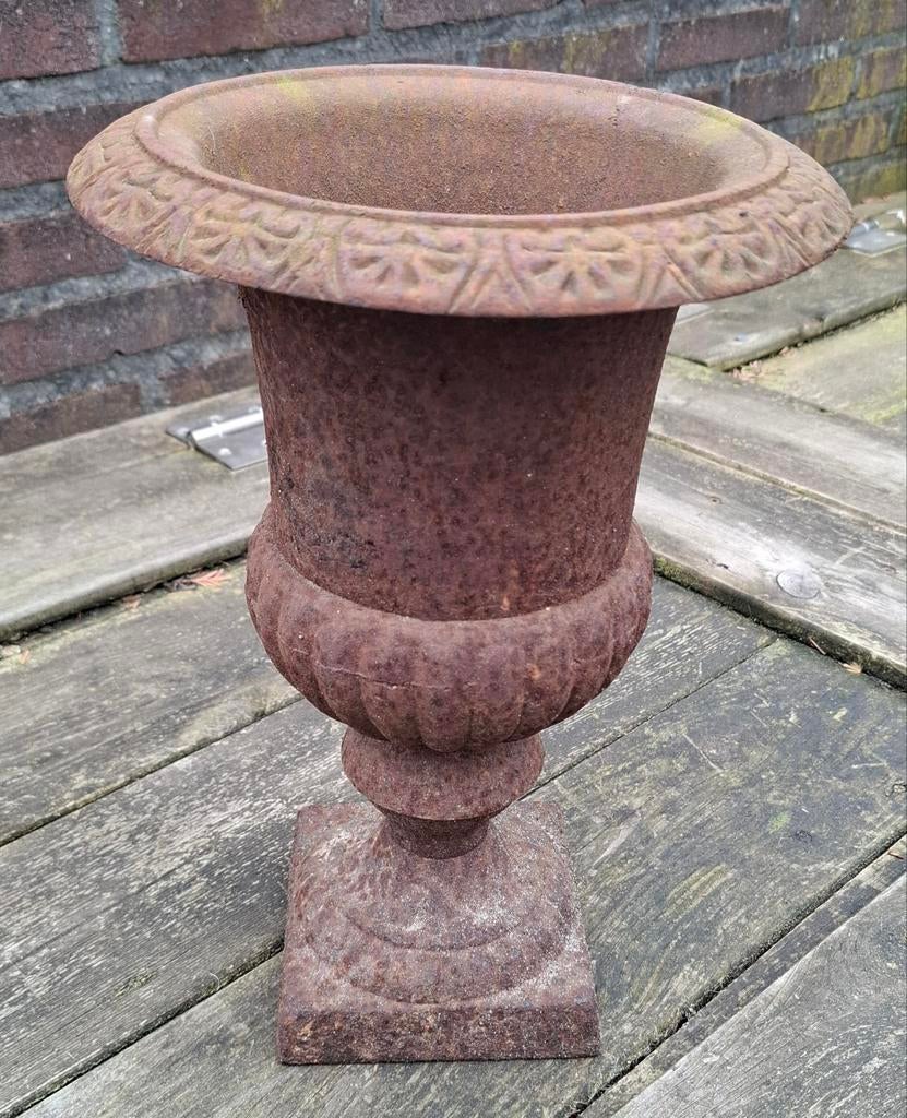 Gietijzeren vaas, Ophalen