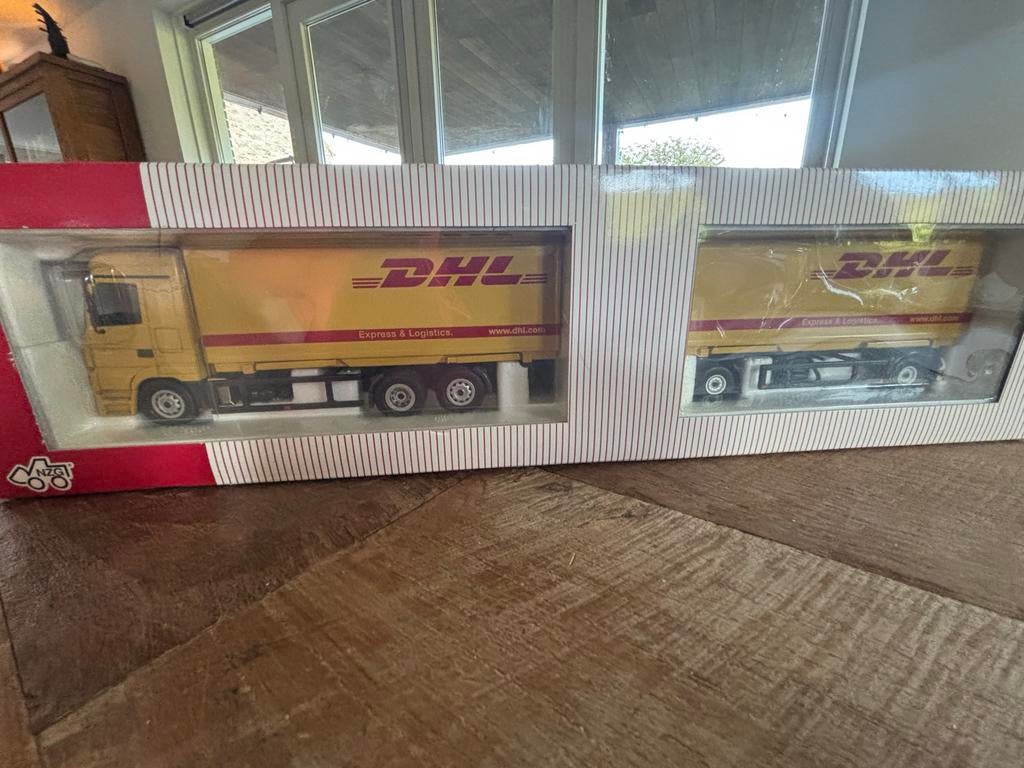 NZG Mercedes-Benz Actros met aanhanger 1:50 DHL - Nieuw, Hobby en Vrije tijd, Modelauto's | 1:50, Ophalen of Verzenden, Nieuw