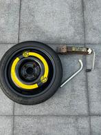 VW thuiskomer met krik en sleutel, Ophalen