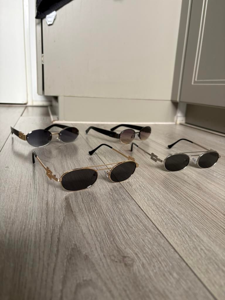 Miu miu zonnebril, Sieraden, Tassen en Uiterlijk, Zonnebrillen en Brillen | Dames, Ophalen of Verzenden, Zo goed als nieuw, Overige merken