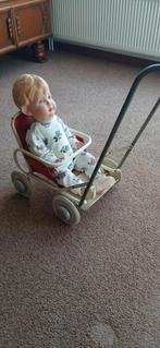 Pop Wildebras antiek met wandelwagen, Ophalen