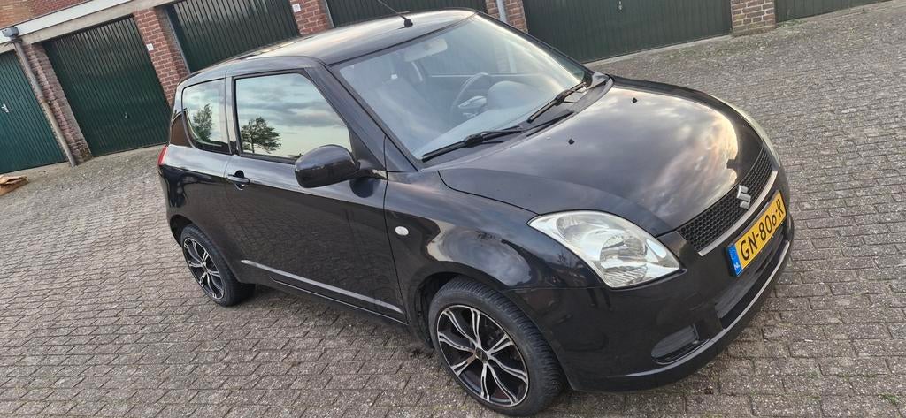 Suzuki Swift 1.3 3D 2007 Zwart, Stof, Handgeschakeld, 1000 kg, Geïmporteerd