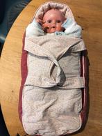 Vintage pop in poppendraagmand, Ophalen