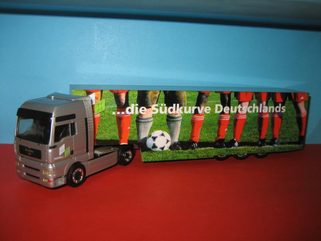 Sudkurve-Dts  Voetbal  MAN  met oplegger  Herpa, Ophalen of Verzenden, Zo goed als nieuw, Bus of Vrachtwagen, Herpa