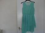 Groene jurk met kant. Maat L., Maat 42/44 (L), Ophalen of Verzenden, Zo goed als nieuw, Boven de knie