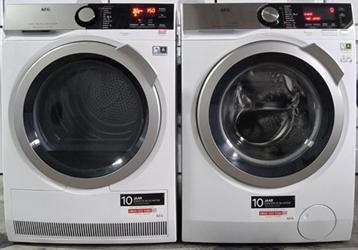 AEG set 8Kg Stoom Wasmachine en AEG 9Kg Warmtepompdroger. beschikbaar voor biedingen