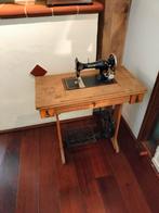 Antieke Singer trap naaimachine, Ophalen