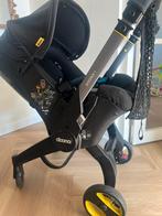 Doona i autostoel/kinderwagen, Ophalen