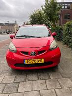 Toyota Aygo 1.0 12V Vvt-i 3DRS MMT 2006 Rood, Auto's, Toyota, Voorwielaandrijving, Stof, Zwart, 4 stoelen
