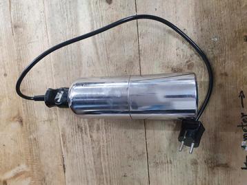Vintage elektrische babykruik beschikbaar voor biedingen