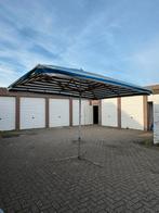 Grote blauw/wit gestreepte parasol, Ophalen