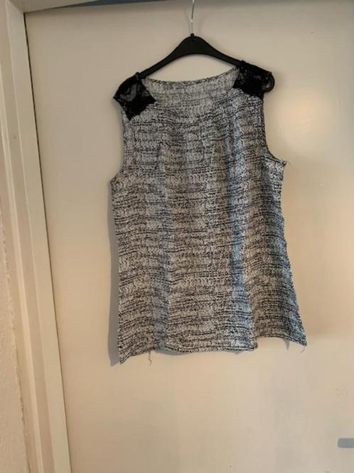 Zwart/witte hemdshirt. Merkloos. Maat S, Kleding | Dames, T-shirts, Zo goed als nieuw, Maat 36 (S), Zwart, Zonder mouw, Ophalen of Verzenden