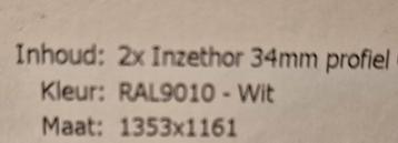 2 x gloednieuwe inzethor RAL 9010 in verpakking.