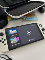 Nintendo switch Oled wit+ games+drie sturen en extra lader, Spelcomputers en Games, Spelcomputers | Nintendo Switch, Zo goed als nieuw
