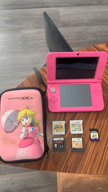 Nintendo 3DS XL + 4 games beschikbaar voor biedingen