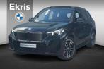 BMW iX1 eDrive20 M Sportpakket Pro 19'' / Panoramadak / Harm, Stof, 750 kg, Met garantie (alle), Zwart
