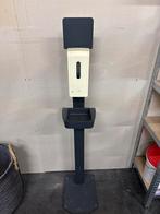 Desinfectiezuil met dispenser, Ophalen