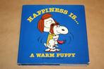 Snoopy - Happiness is...a warm puppy !!, Boeken, Ophalen of Verzenden, Zo goed als nieuw