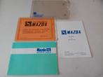 Mazda 929  instructieboekje en coupon, Ophalen of Verzenden, Zo goed als nieuw, Overige niveaus, Nederlands