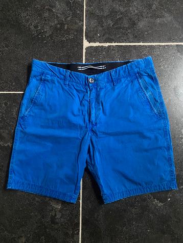 Blauwe Stone Island korte broek W33 beschikbaar voor biedingen