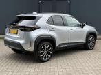 Toyota Yaris Cross 1.5 Hybrid 115 Dynamic / Tot 10 jaar Gara, Auto's, Toyota, Stof, Gebruikt, 1165 kg, 116 pk