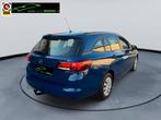 Opel Astra Sports Tourer 1.2 Business Edition (bj 2020), Auto's, Opel, Voorwielaandrijving, Gebruikt, 1199 cc, Blauw