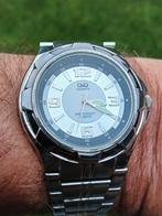 Nette Q&Q Quartz horloge met stalen band, Ophalen of Verzenden