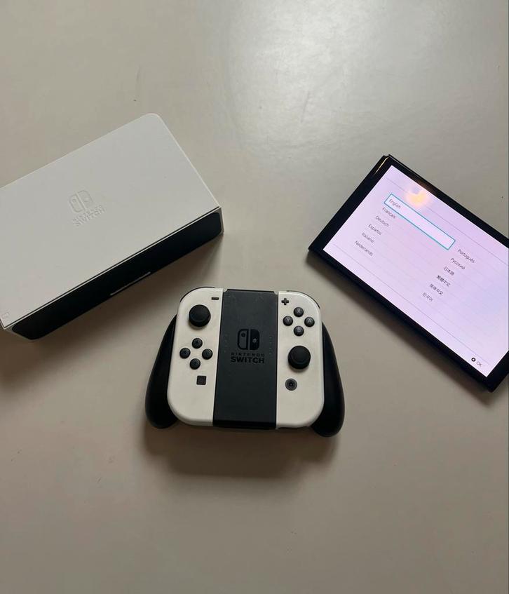 Nintendo Switch OLED + Nintendo Sport Accessoires, Spelcomputers en Games, Spelcomputers | Nintendo Switch, Refurbished, Switch OLED