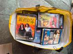 50-75 dvd's muziek en films, volle big shoppertas, Alle leeftijden, Ophalen, Zo goed als nieuw