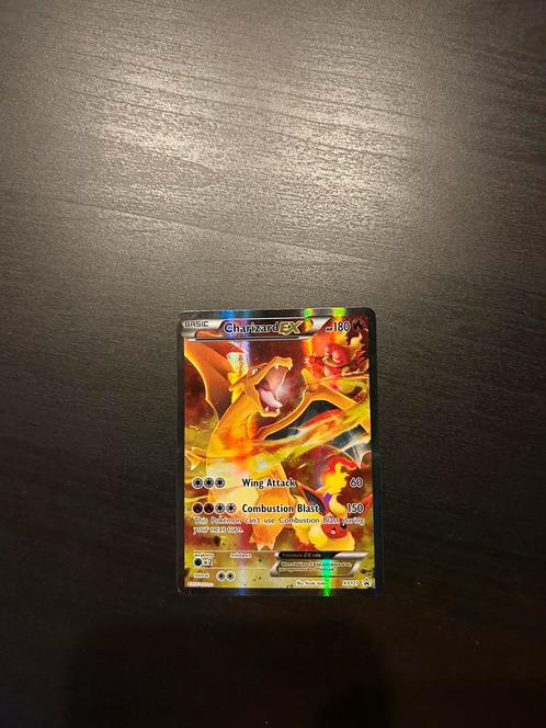 Pokemon - Charizard EX Xy121, Hobby en Vrije tijd, Verzamelkaartspellen | Pokémon, Zo goed als nieuw, Losse kaart, Foil, Ophalen of Verzenden