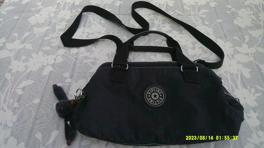 Kipling schoudertas, handtas, donkerblauw met aapje., Sieraden, Tassen en Uiterlijk, Tassen | Damestassen, Ophalen of Verzenden
