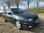 Opel Astra 2.0 GSI Tailgate 16V 1995 Zwart, Auto's, Voorwielaandrijving, 1998 cc, 4 cilinders, Zwart