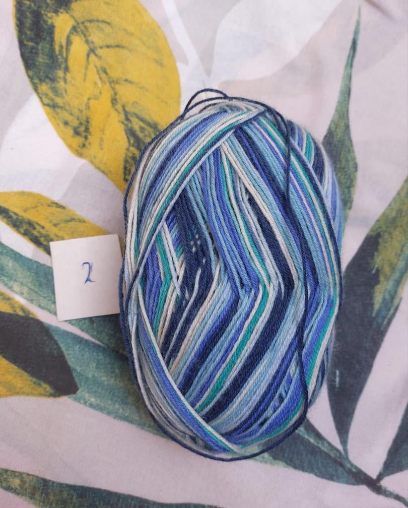 1 bol sokkenwol blauw gemêleerd  Regia, Hobby en Vrije tijd, Breien en Haken, Ophalen of Verzenden, Nieuw, Breien of Haken, Wol of Garen