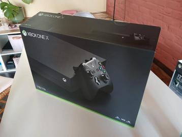Xbox one x met 6 spelen  beschikbaar voor biedingen