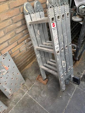 4 delige aluminium vouwladder met loopplanken  beschikbaar voor biedingen