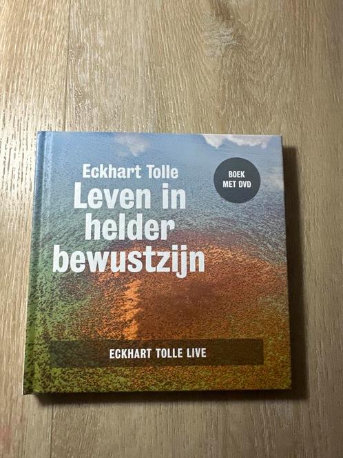 Eckhart Tolle - Leven in helder bewustzijn + DVD, Boeken, Esoterie en Spiritualiteit, Zo goed als nieuw, Achtergrond en Informatie